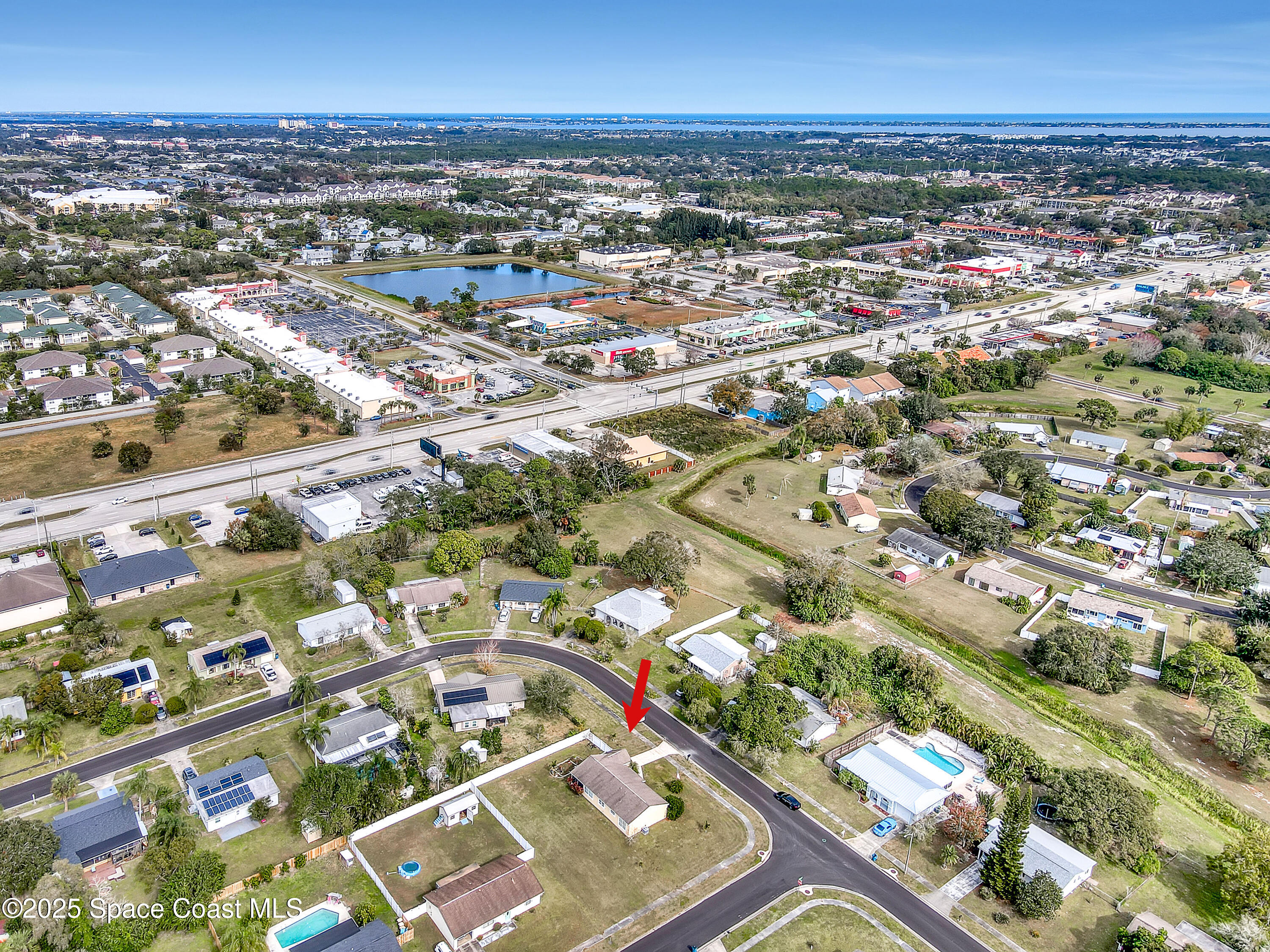 1513 Creel Road Northeast Palm Bay, FL 32905 - Photo 30 of 31 an aerial view of a city