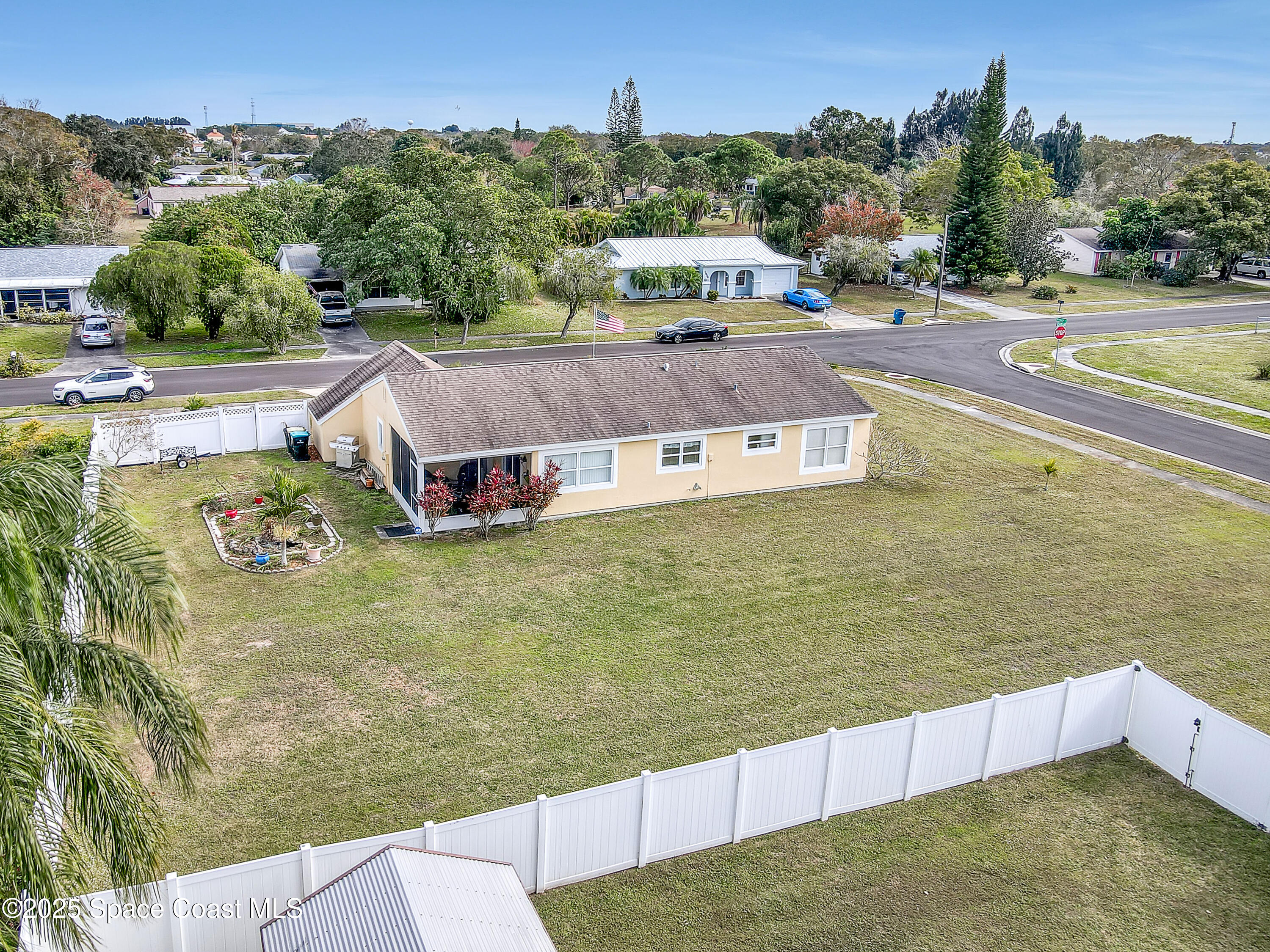 1513 Creel Road Northeast Palm Bay, FL 32905 - Photo 31 of 31 a view of a swimming pool with an ocean view