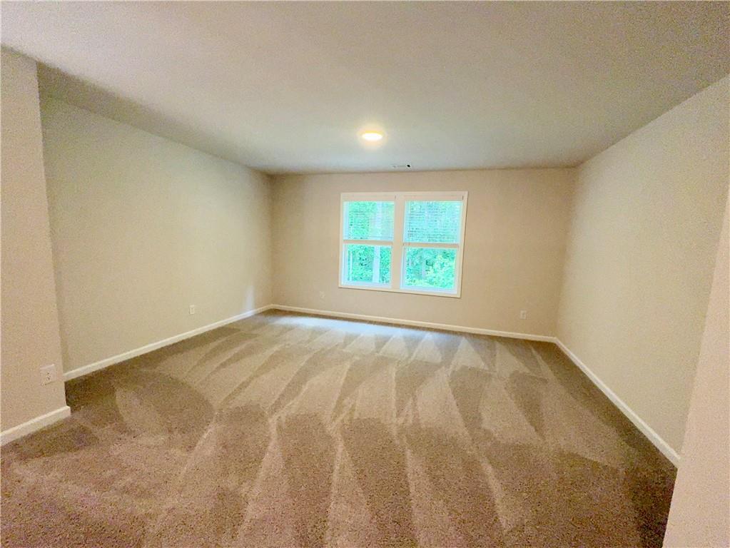 2225 Sun Valley Buford, GA 30519 - Photo 13 of 23 an empty room with a window