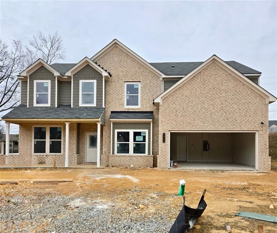 2225 Sun Valley Buford, GA 30519 - Photo 2 of 23 a front view of a house with a yard
