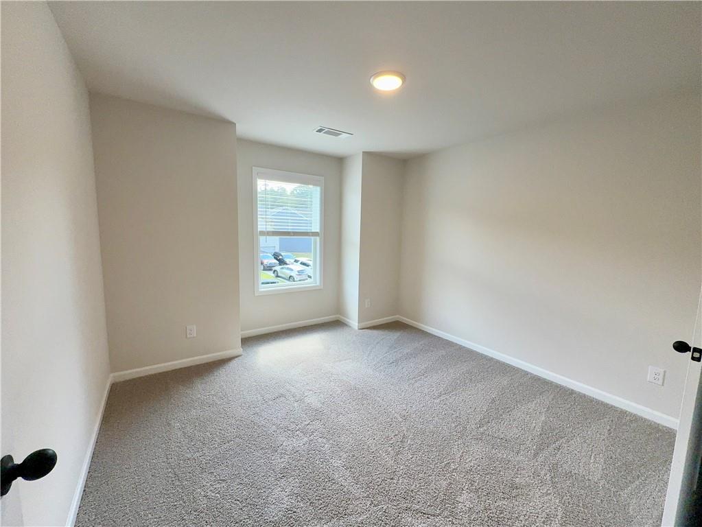 2225 Sun Valley Buford, GA 30519 - Photo 21 of 23 an empty room with windows