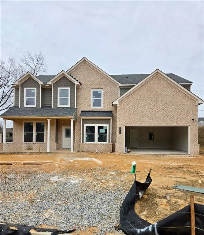 2225 Sun Valley Buford, GA 30519 - Photo 3 of 23 a front view of a house with garden