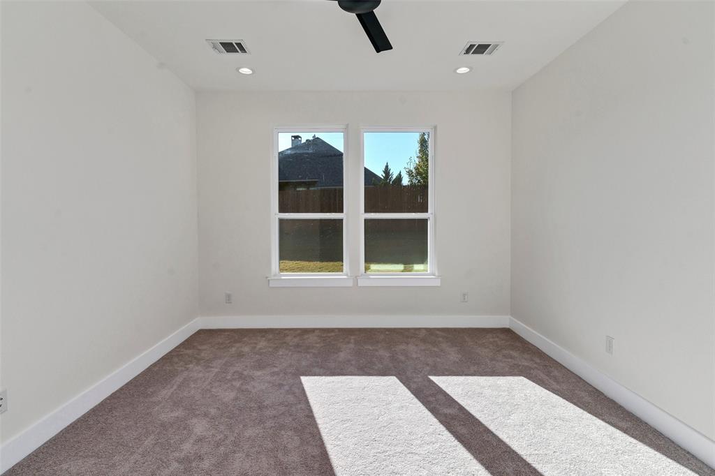3306 Promenade Court Granbury, TX 76049 - Photo 21 of 40 an empty room with windows