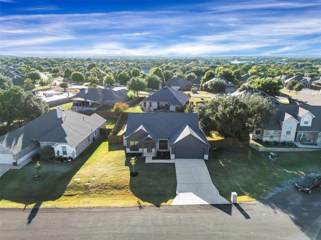3306 Promenade Court Granbury, TX 76049 - Photo 37 of 40 an aerial view of a house with a ocean view