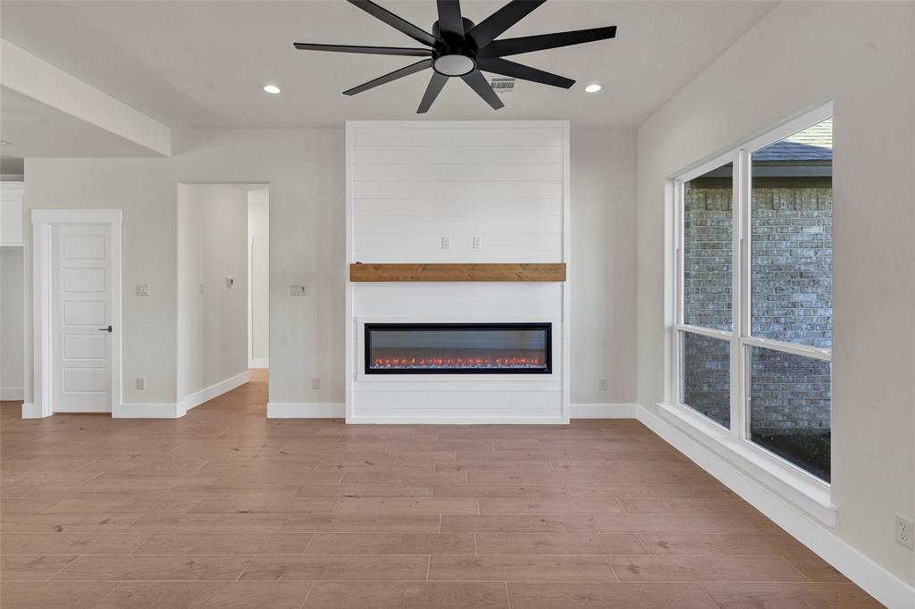 3306 Promenade Court Granbury, TX 76049 - Photo 6 of 40 a view of an empty room with a window