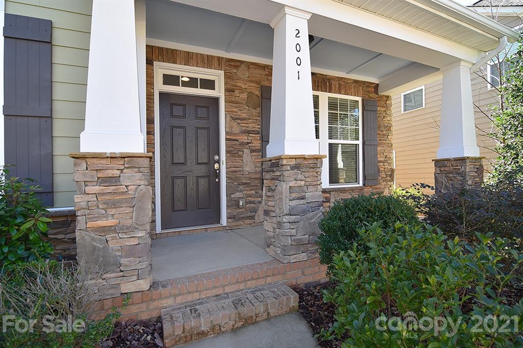 2001 Fallondale Road Waxhaw, NC 28173 - Photo 2 of 36 front view of a brick house with a large windows