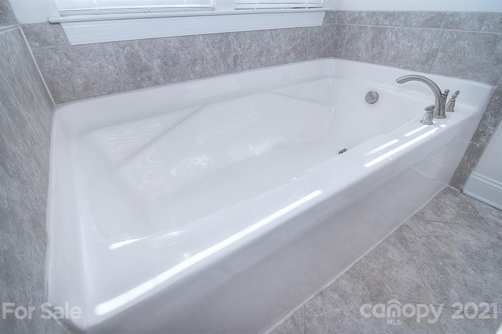 2001 Fallondale Road Waxhaw, NC 28173 - Photo 15 of 36 a bathroom with a bathtub