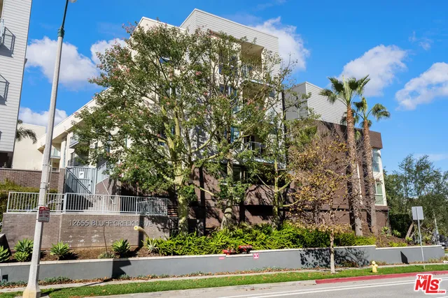 front view of a house with a street