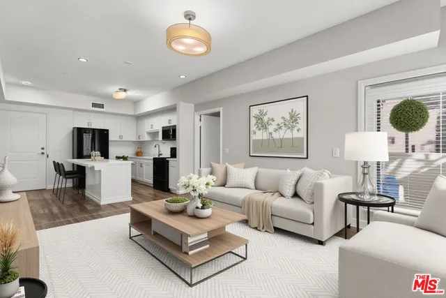 a living room with furniture and a table