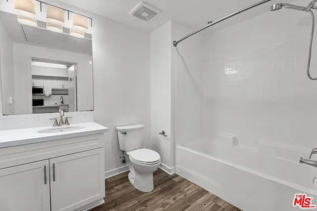 a bathroom with a toilet sink and a bathtub