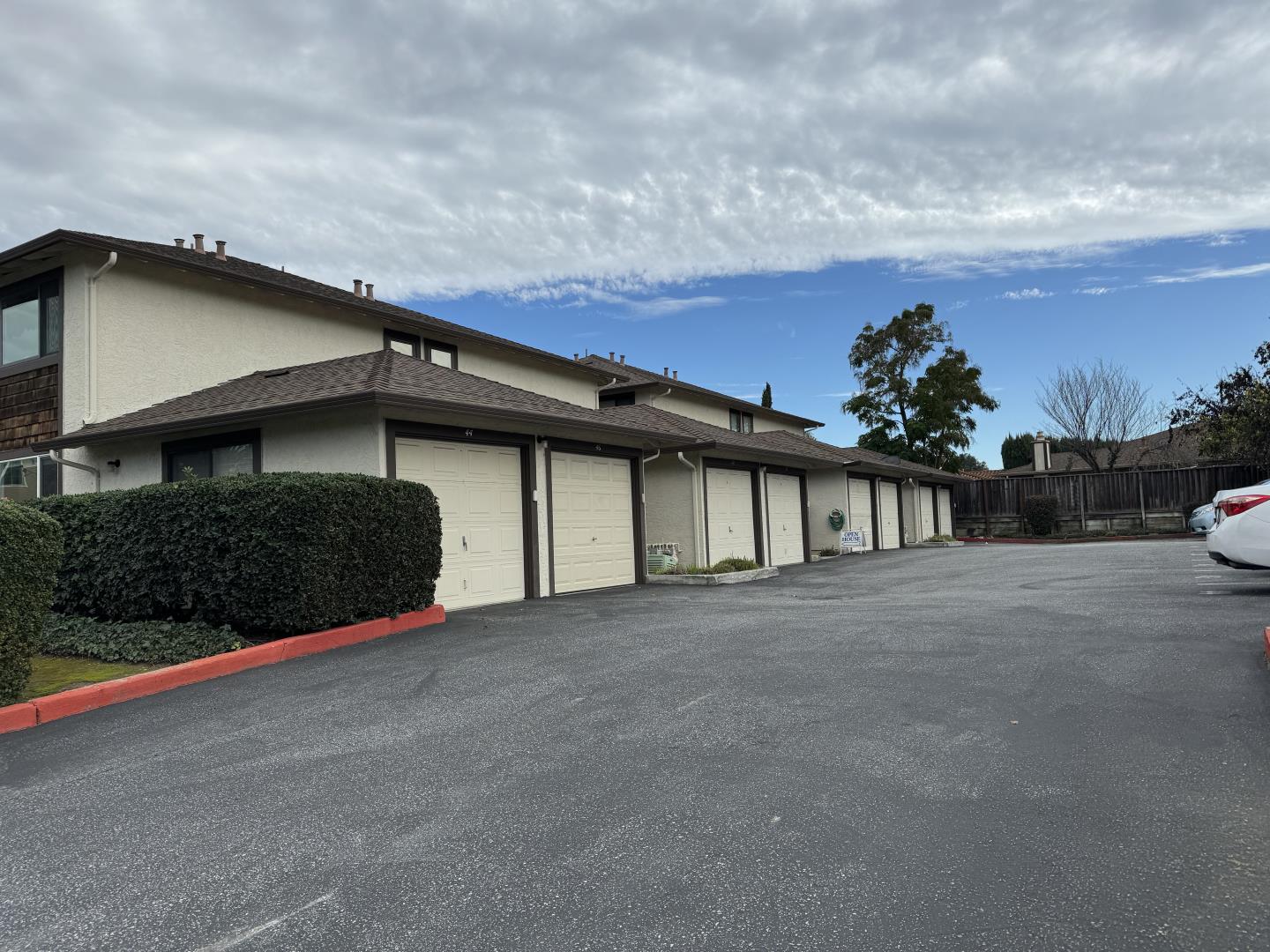 4944 Canto Drive San Jose, CA 95124 - Photo 1 of 20 a front view of a house with a yard and garage