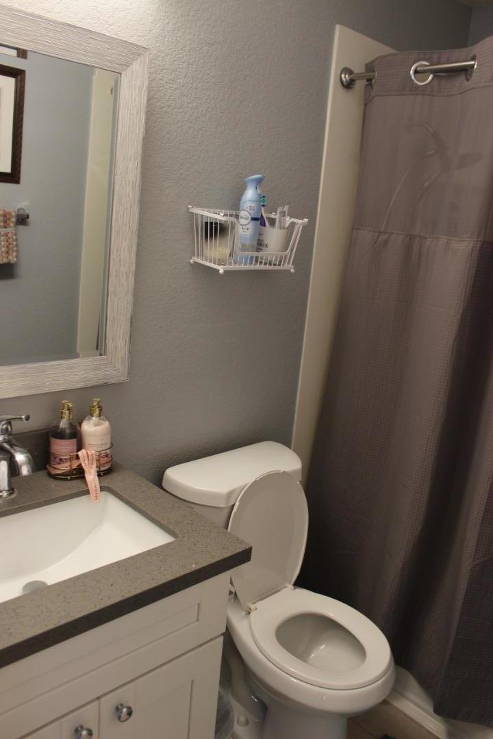 4944 Canto Drive San Jose, CA 95124 - Photo 16 of 20 a white toilet sitting next to a bathroom sink