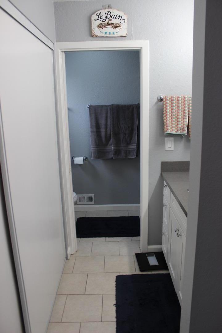 4944 Canto Drive San Jose, CA 95124 - Photo 17 of 20 a bathroom with a sink and a mirror