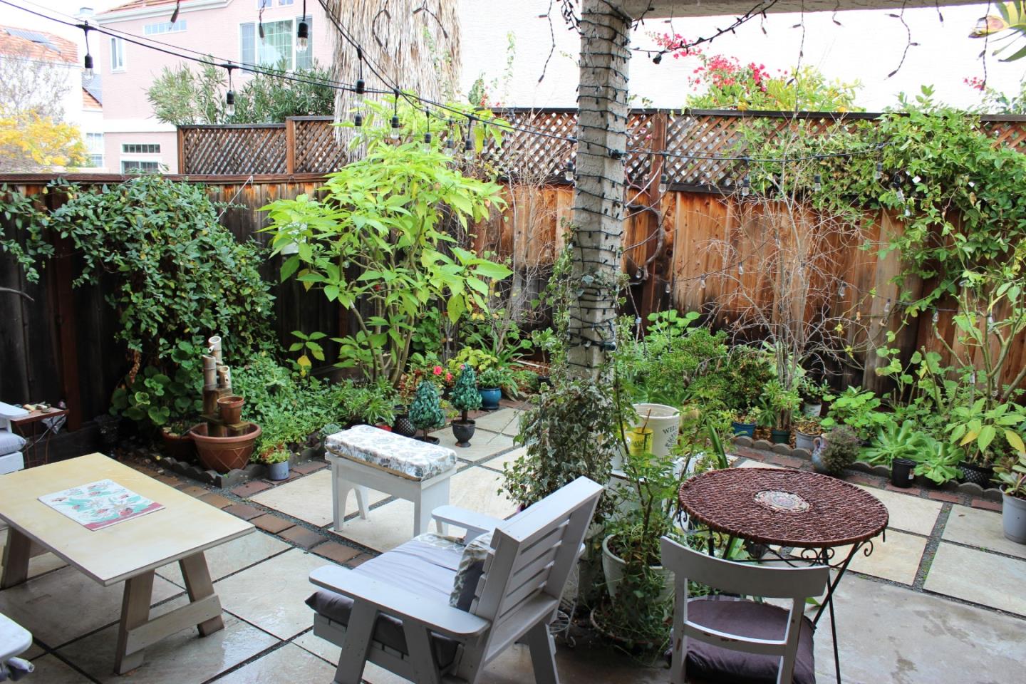 4944 Canto Drive San Jose, CA 95124 - Photo 2 of 20 a view of a chairs and table in a backyard