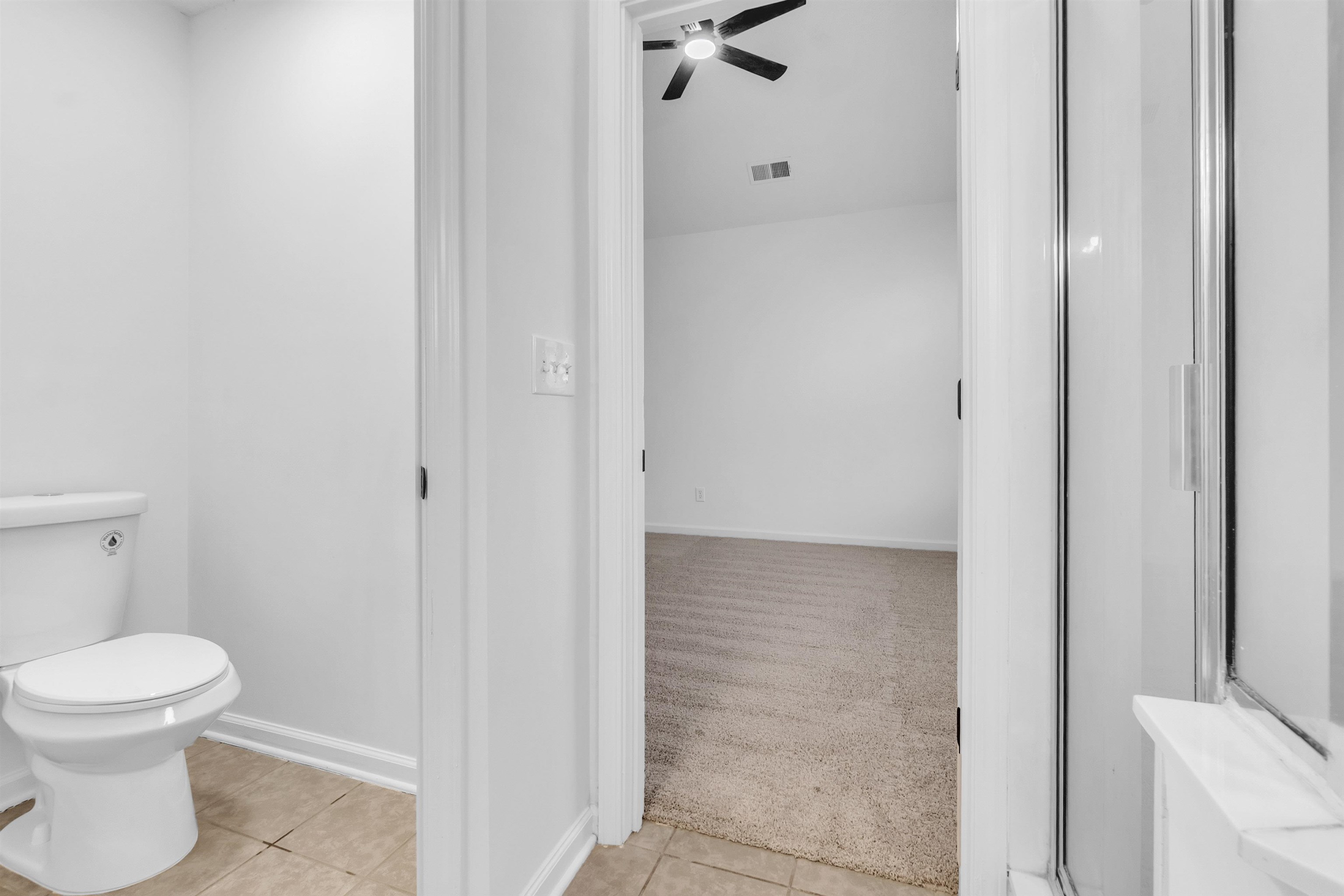 3904 August Moon Cove Memphis, TN 38135 - Photo 20 of 25 a bathroom with a toilet