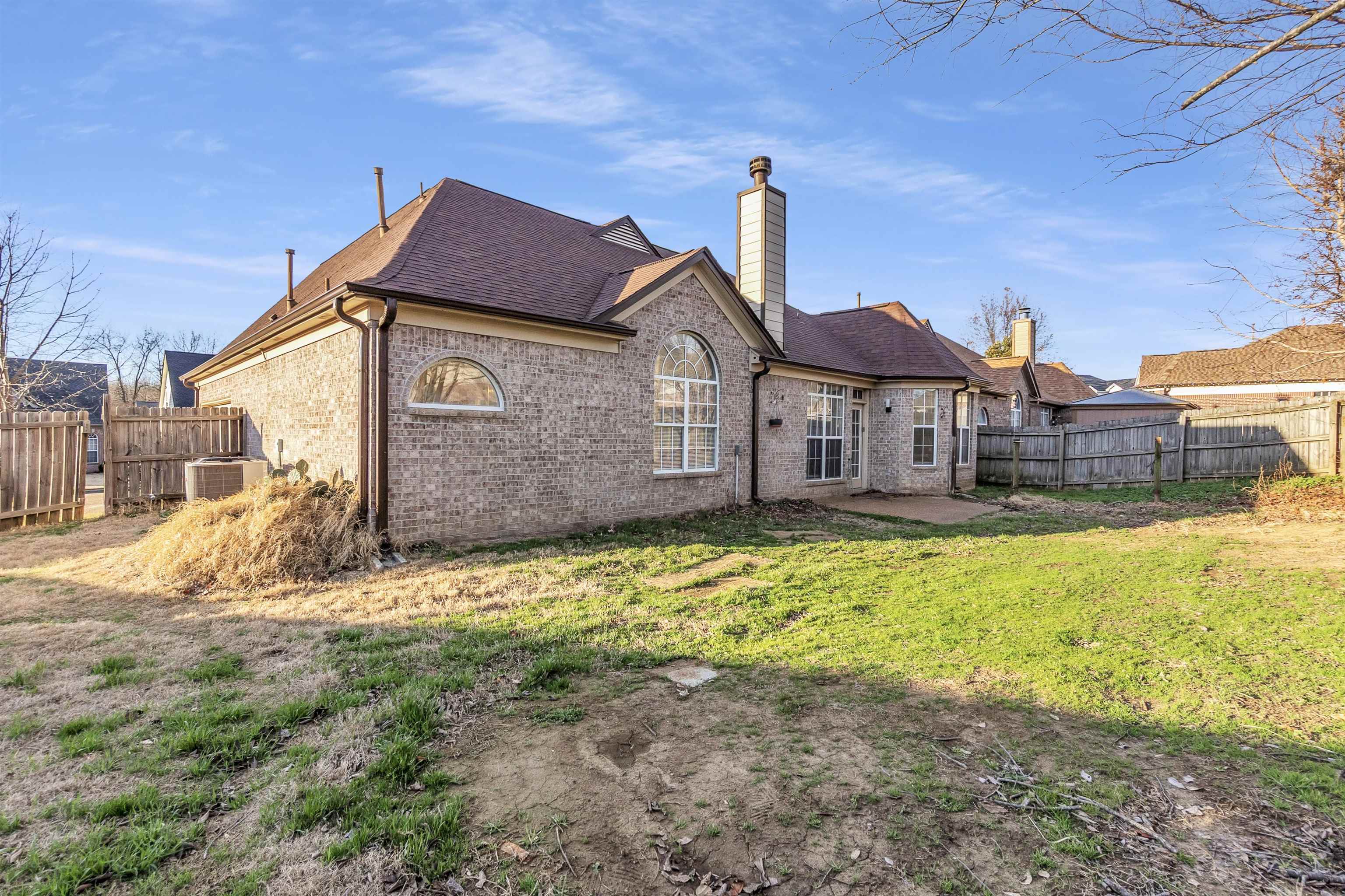 3904 August Moon Cove Memphis, TN 38135 - Photo 22 of 25 a front view of a house with a yard