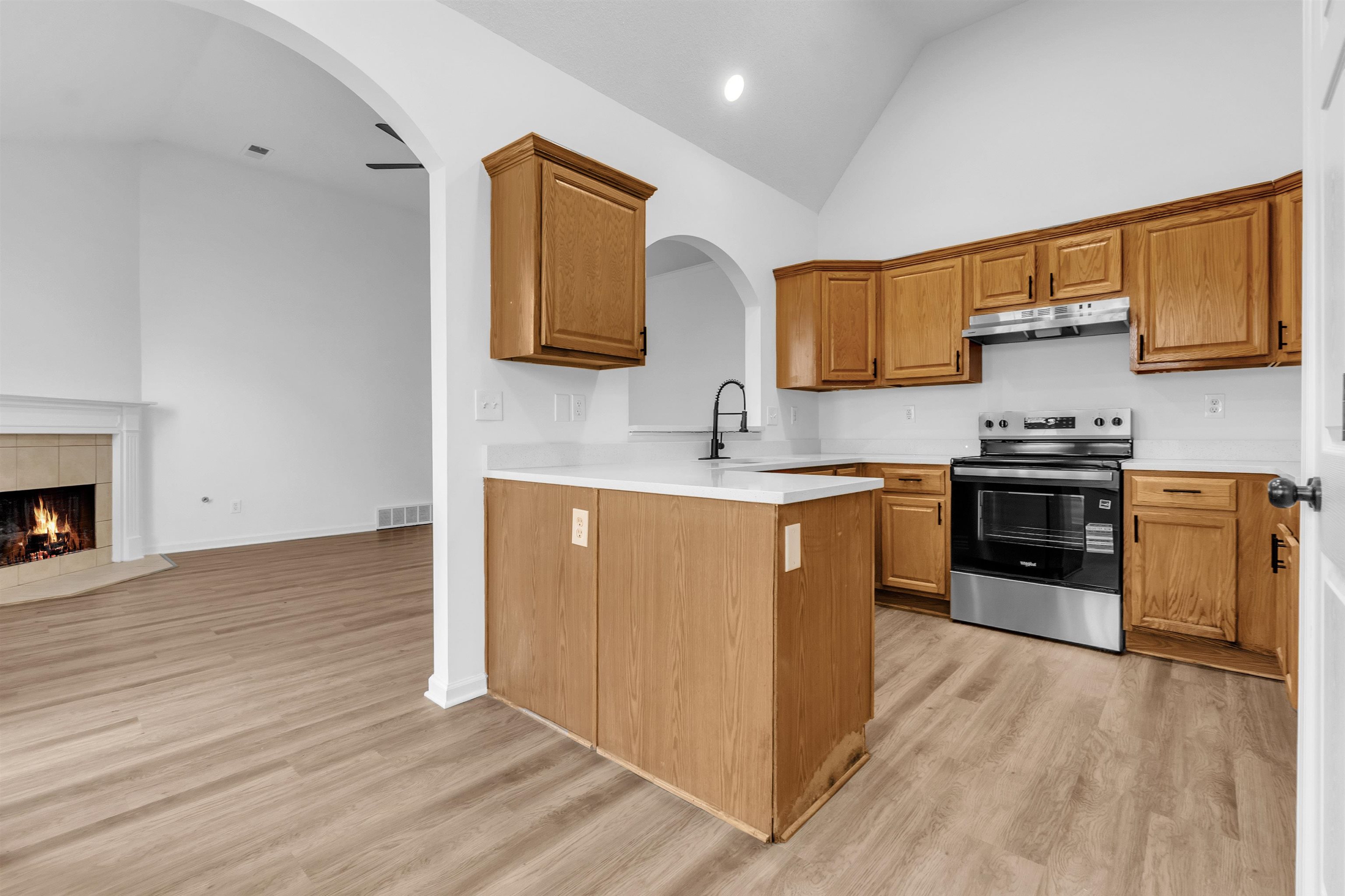 3904 August Moon Cove Memphis, TN 38135 - Photo 5 of 25 a kitchen with stainless steel appliances granite countertop a stove a sink and a microwave
