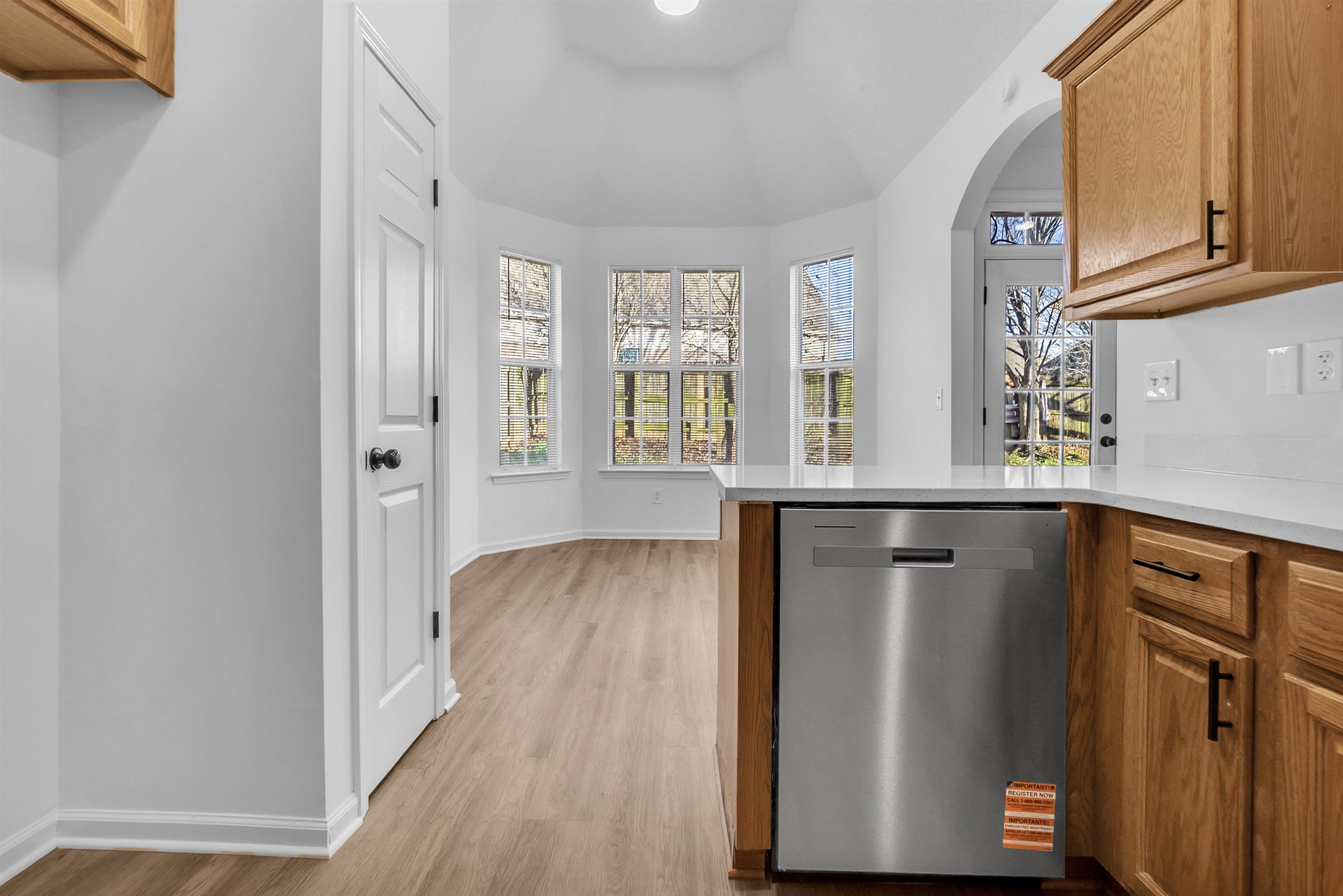 3904 August Moon Cove Memphis, TN 38135 - Photo 6 of 25 a view of hallway with window and wooden floor