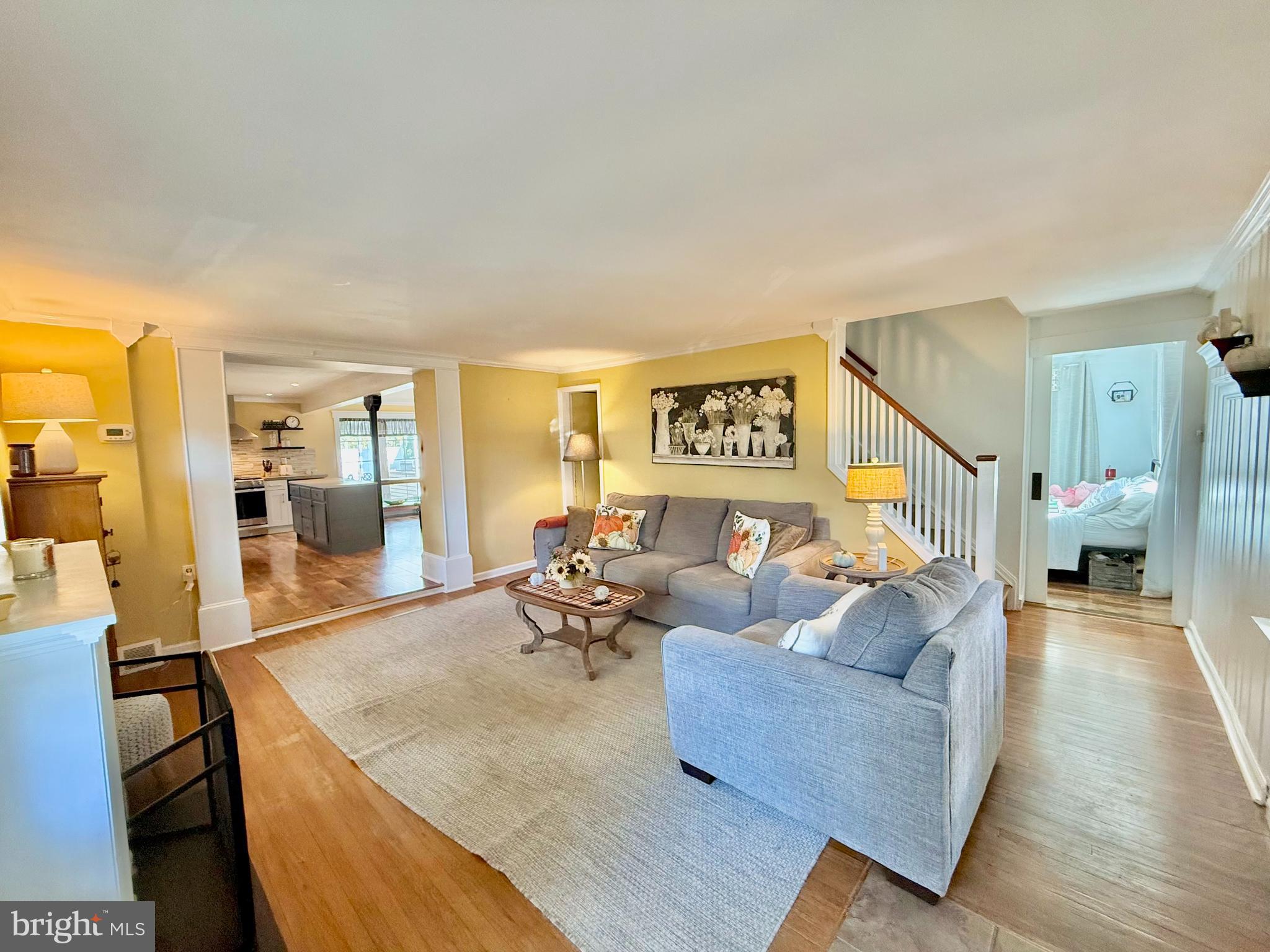 1303 Bruce Road Oreland, PA 19075 - Photo 5 of 13 a living room with furniture and wooden floor