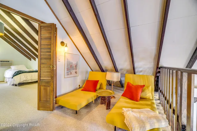 a view of a hallway with stairs