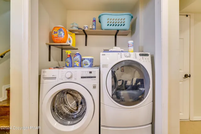 a bathroom with a sink a mirror and shower