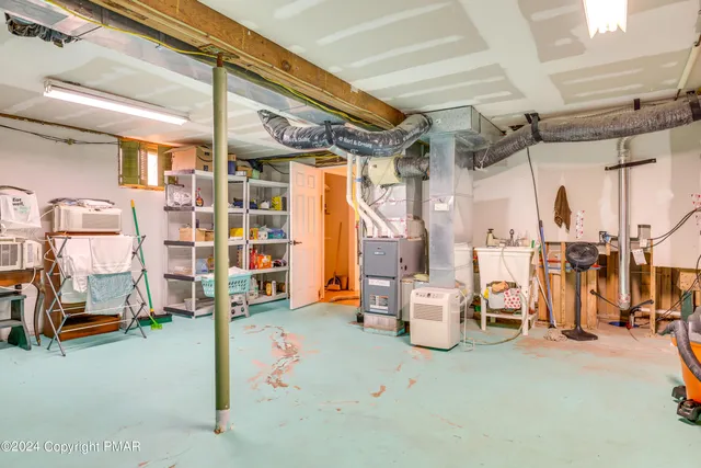 a view of a chairs and tables in the patio
