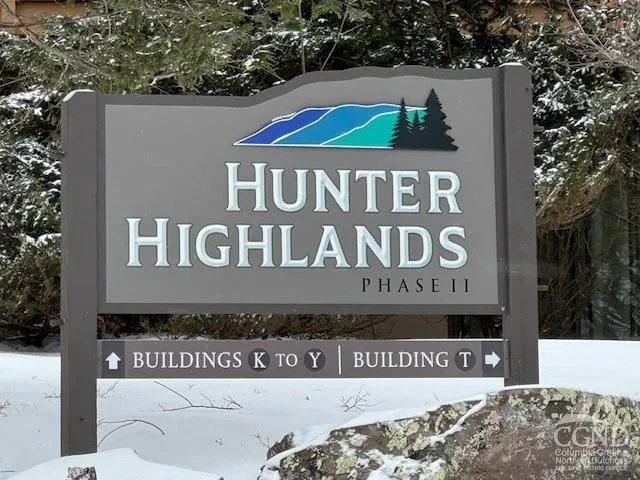 a sign that is on the side of a building