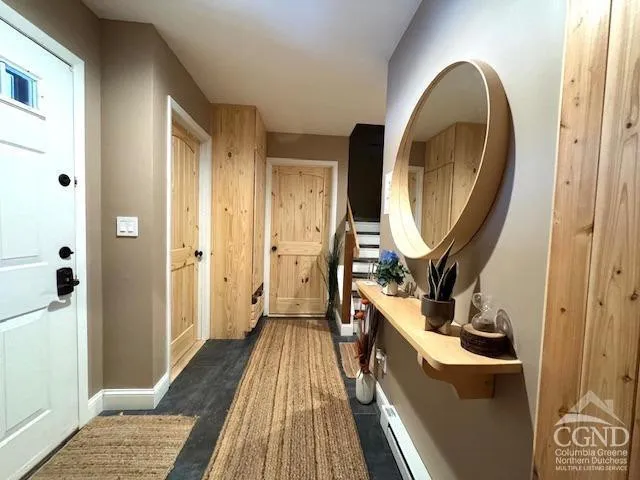 a view of a bedroom from a hallway