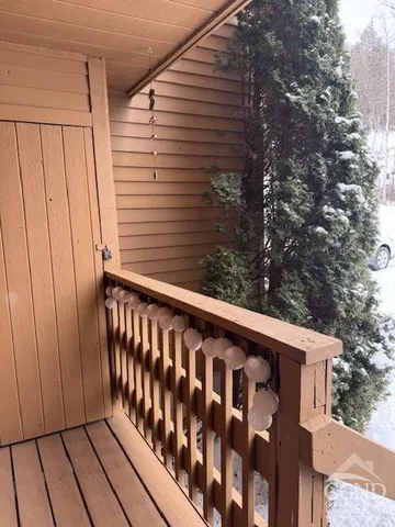 a view of a door and a window