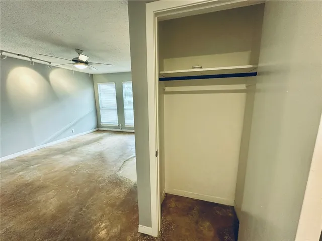a view of a kitchen and a window