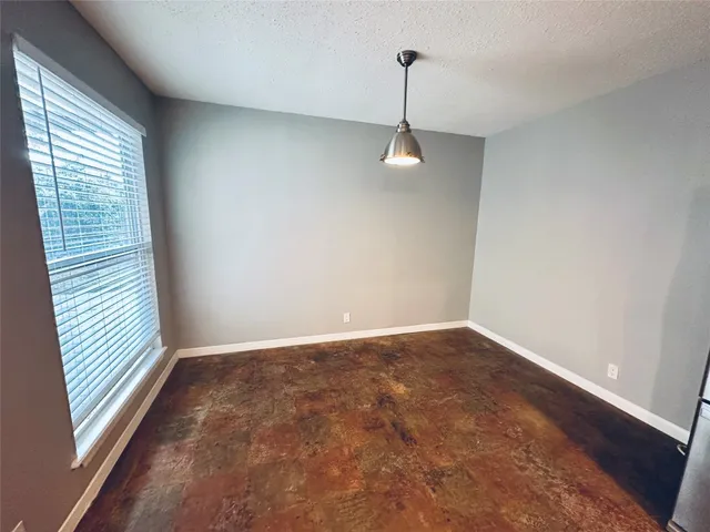 a room with a sink and a mirror