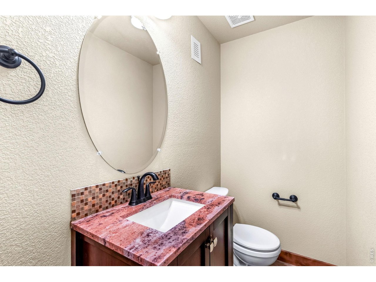 855 Mount Massive Street Berthoud, CO 80513 - Photo 11 of 25 Half bath on the main floor