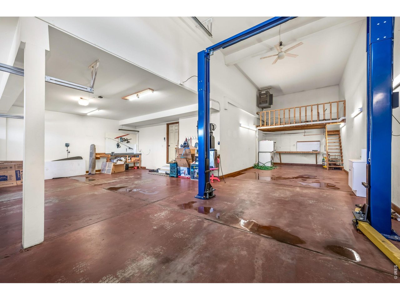 855 Mount Massive Street Berthoud, CO 80513 - Photo 22 of 25 Oversized garage with RV garage and car lift