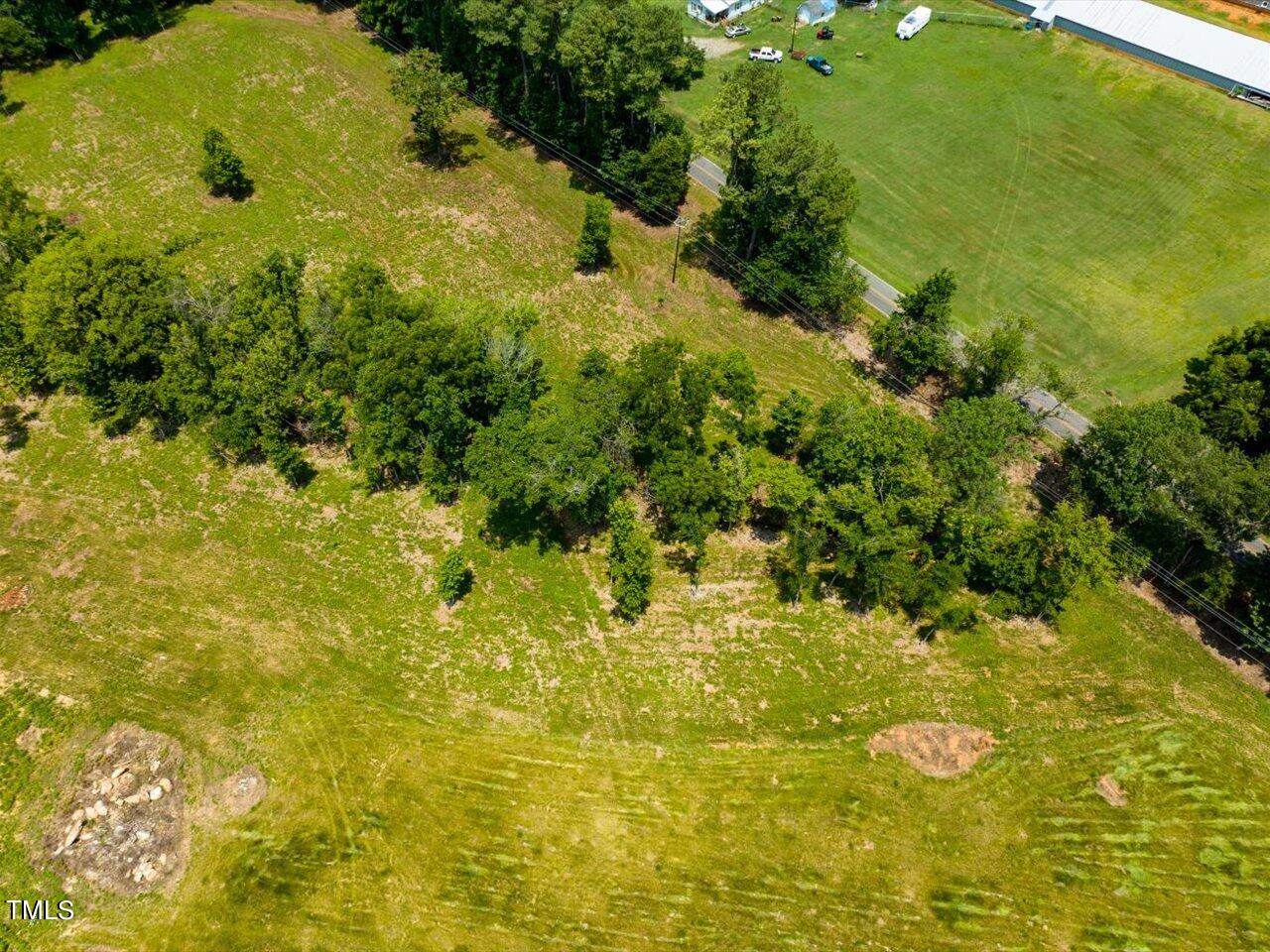 345 Buck Gunter Road Siler City, NC 27344 - Photo 4 of 14 a view of a small yard with green space