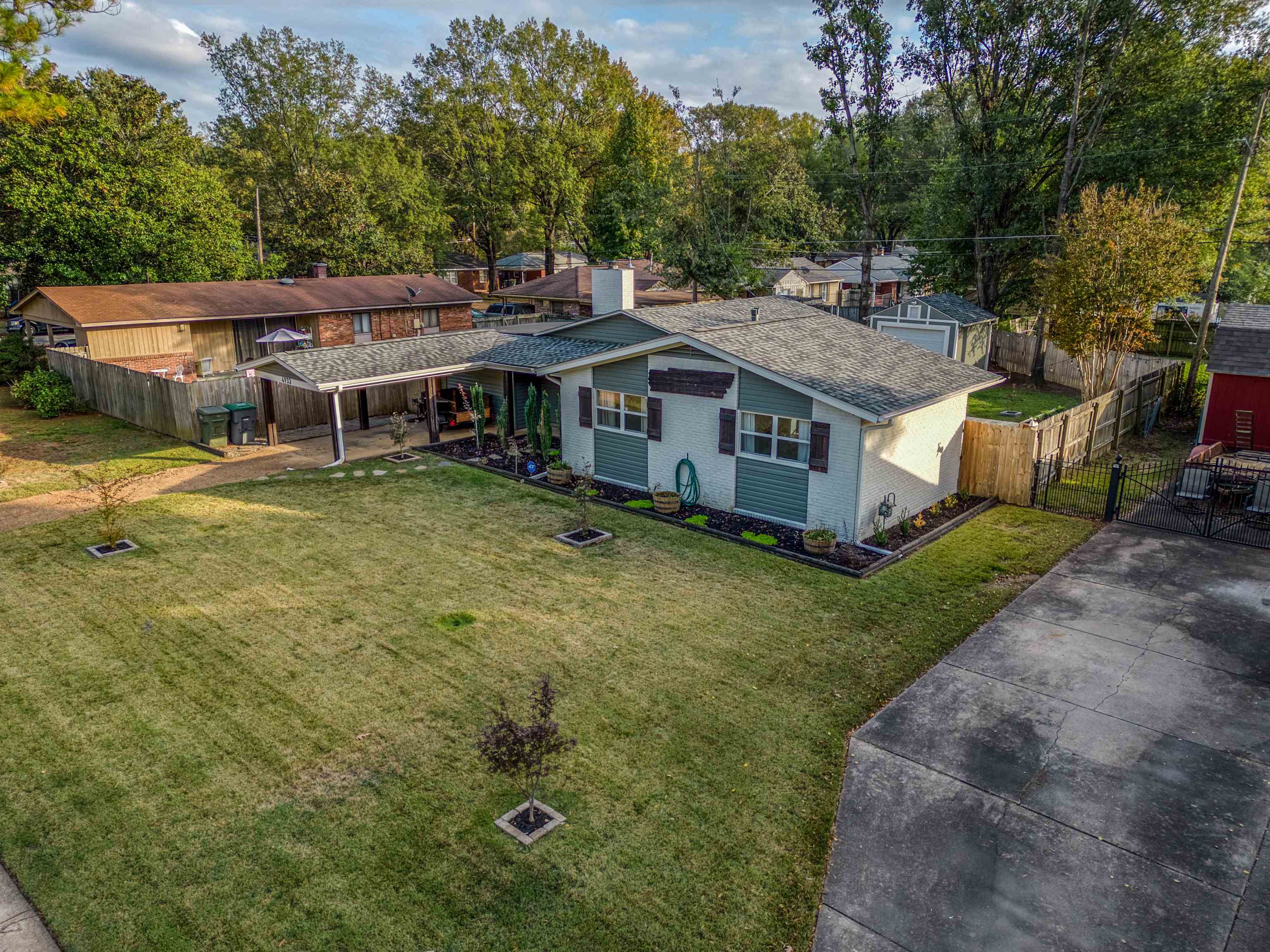 4933 Helene Road Memphis, TN 38117 - Photo 4 of 27 a view of a house with a yard balcony and sitting area