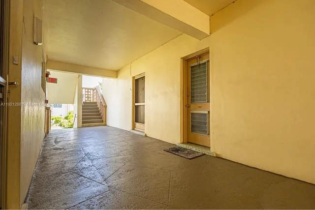 a view of a house with a street