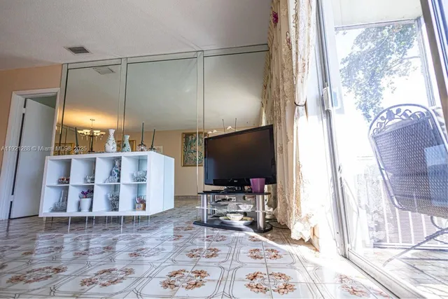 a view of a park with a tree