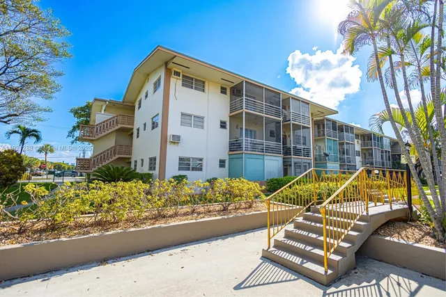 a view of a house with a street