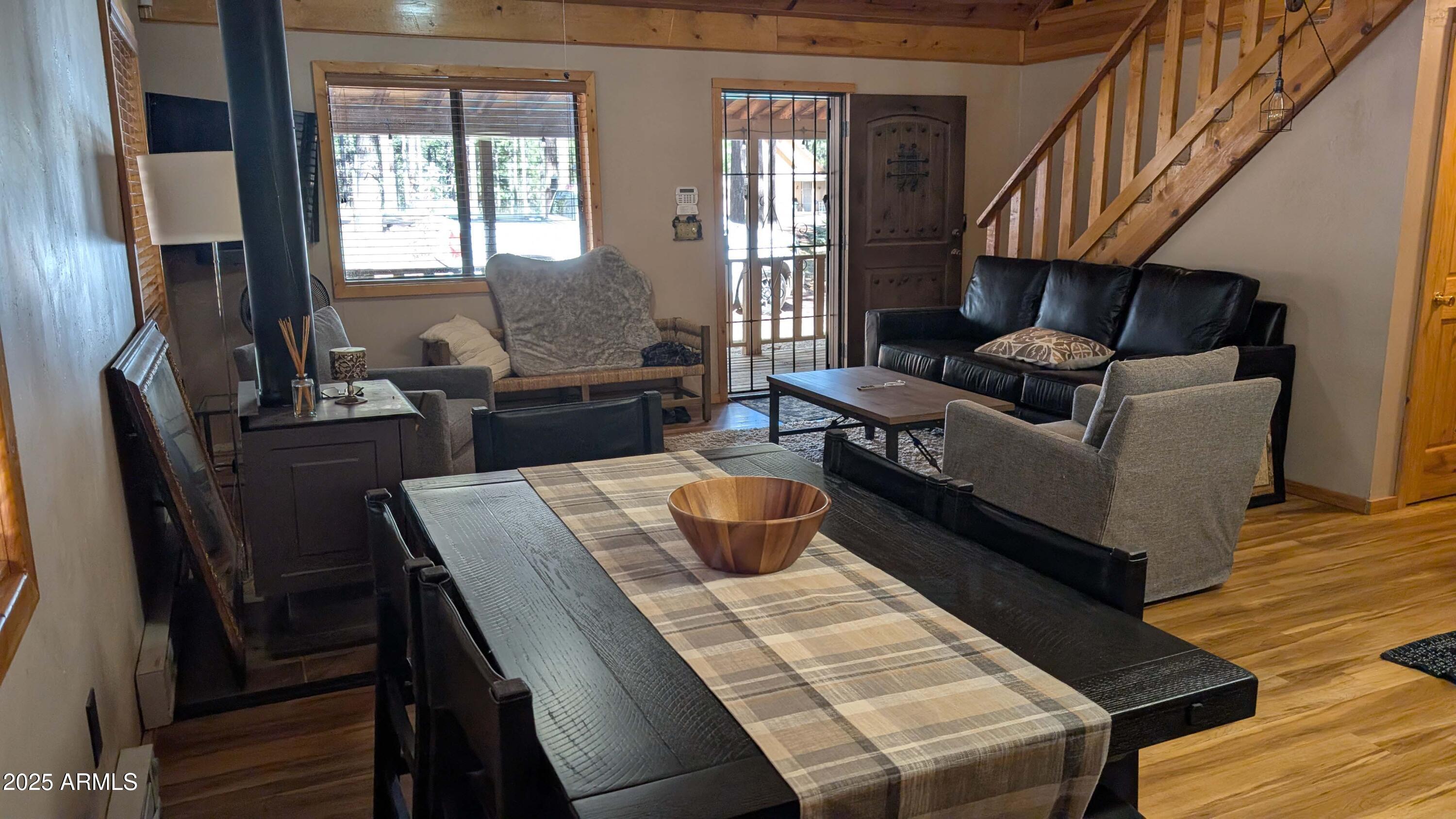 2425 Tall Trees Loop Forest Lakes, AZ 85931 - Photo 9 of 43 a living room with furniture and a potted plant