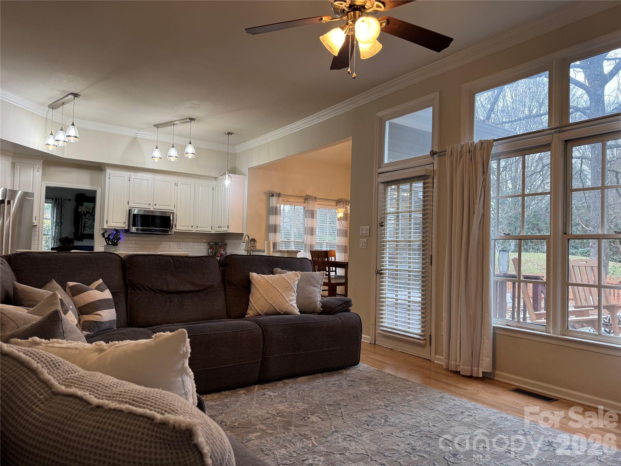 4846 Fortunes Ridge Trail Charlotte, NC 28269 - Photo 15 of 43 a living room with furniture and a large window