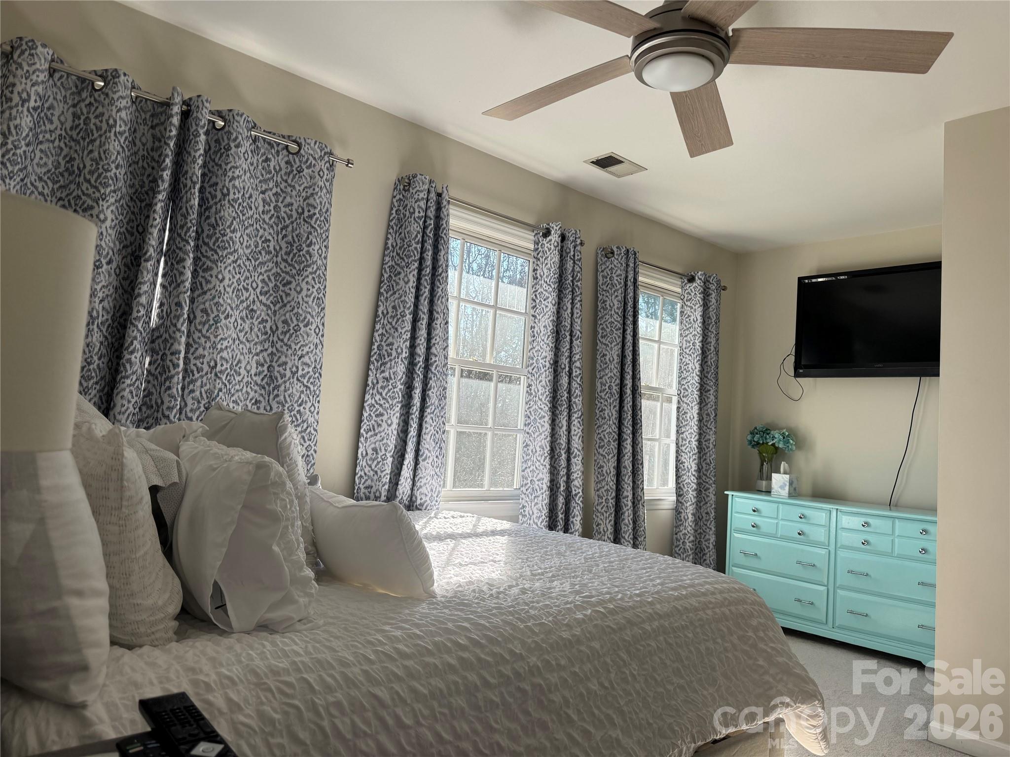 4846 Fortunes Ridge Trail Charlotte, NC 28269 - Photo 18 of 43 a bedroom with furniture and a window