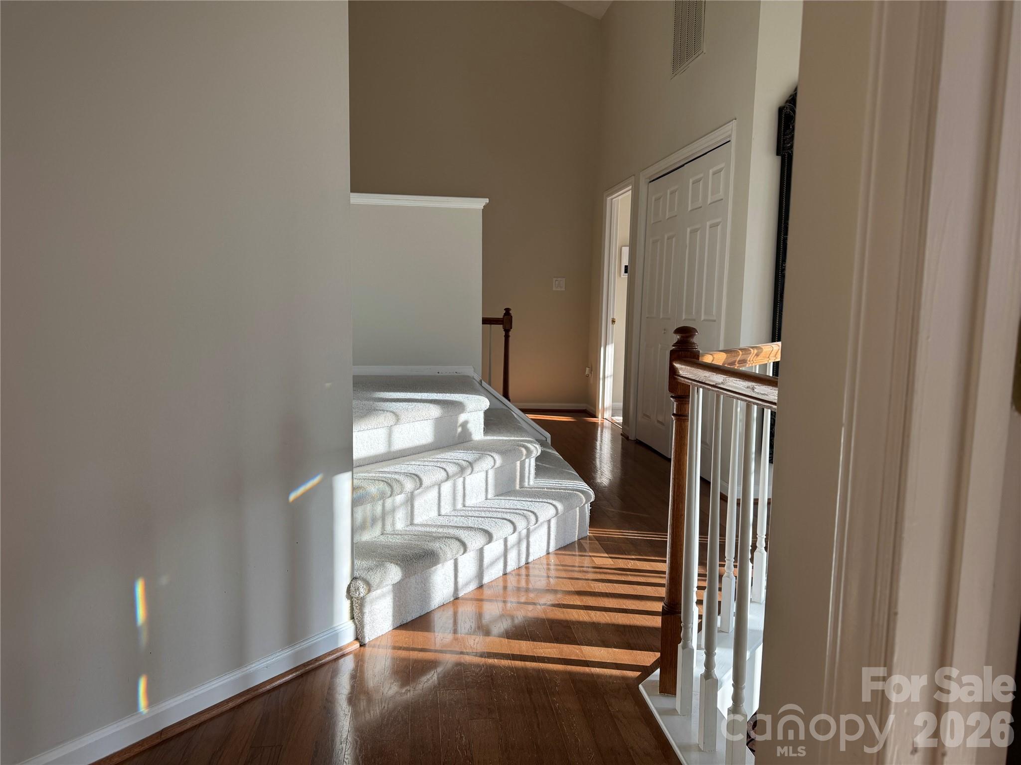 4846 Fortunes Ridge Trail Charlotte, NC 28269 - Photo 19 of 43 a view of a balcony with wooden floor