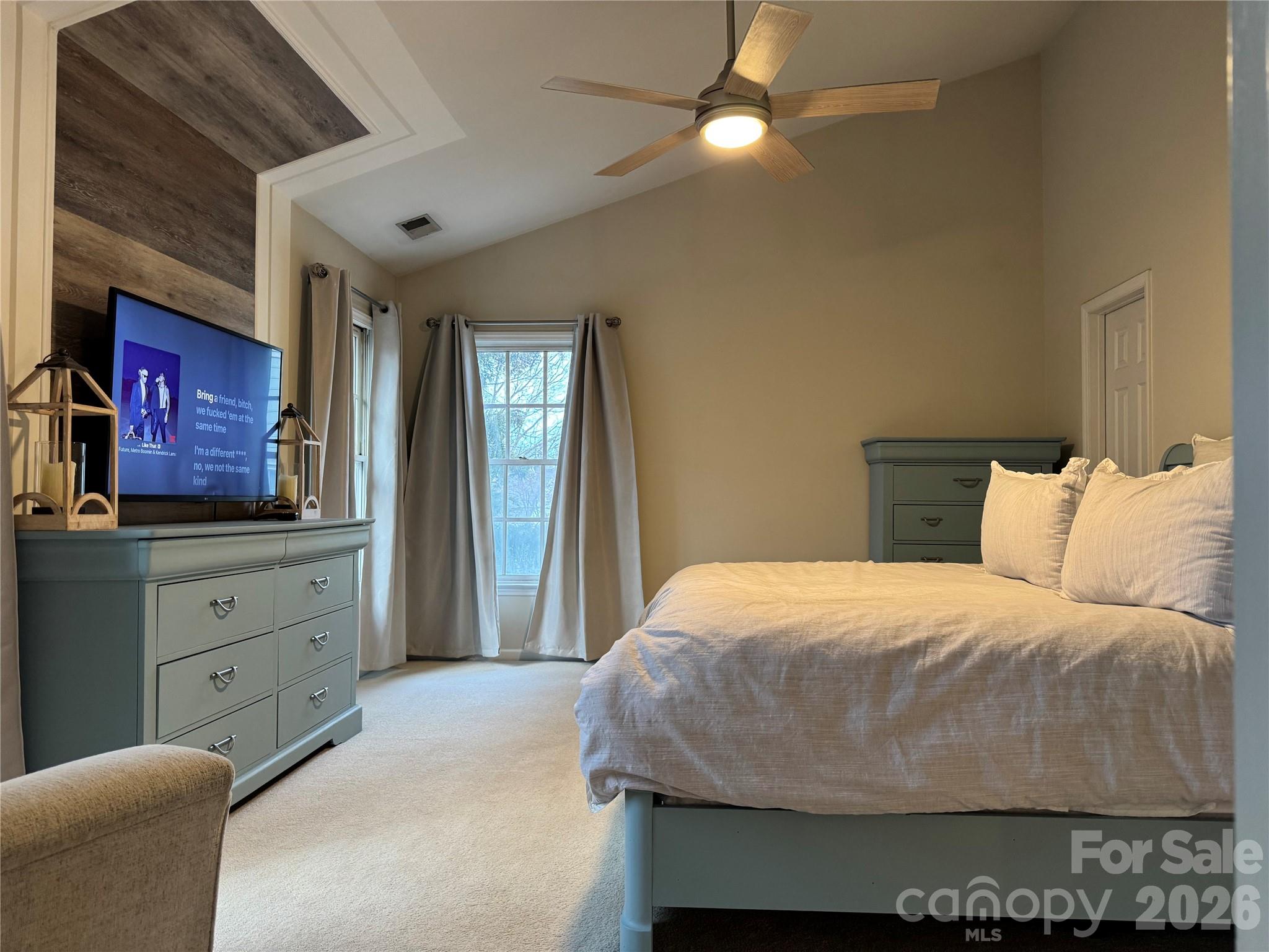 4846 Fortunes Ridge Trail Charlotte, NC 28269 - Photo 23 of 43 a bedroom with a bed and a dresser