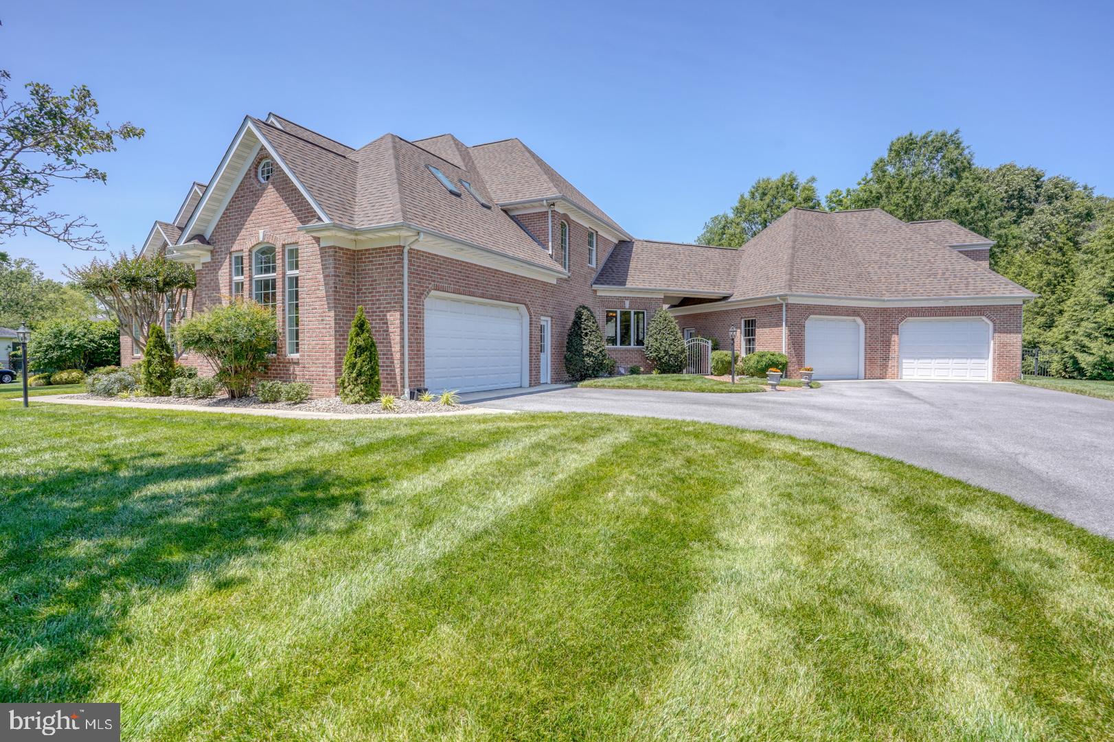 9 Chadwick Drive Dover, DE 19901 - Photo 3 of 14 a front view of a house with a yard