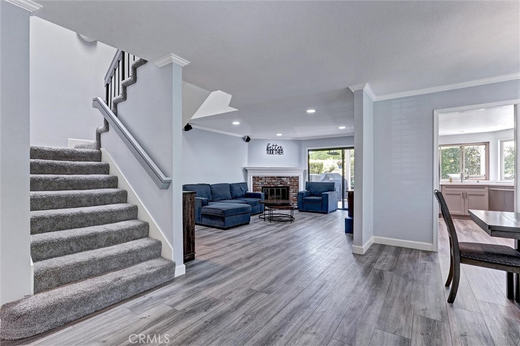 19605 Shadow Springs Way Porter Ranch, CA 91326 - Photo 2 of 33 View of family room and kitchen