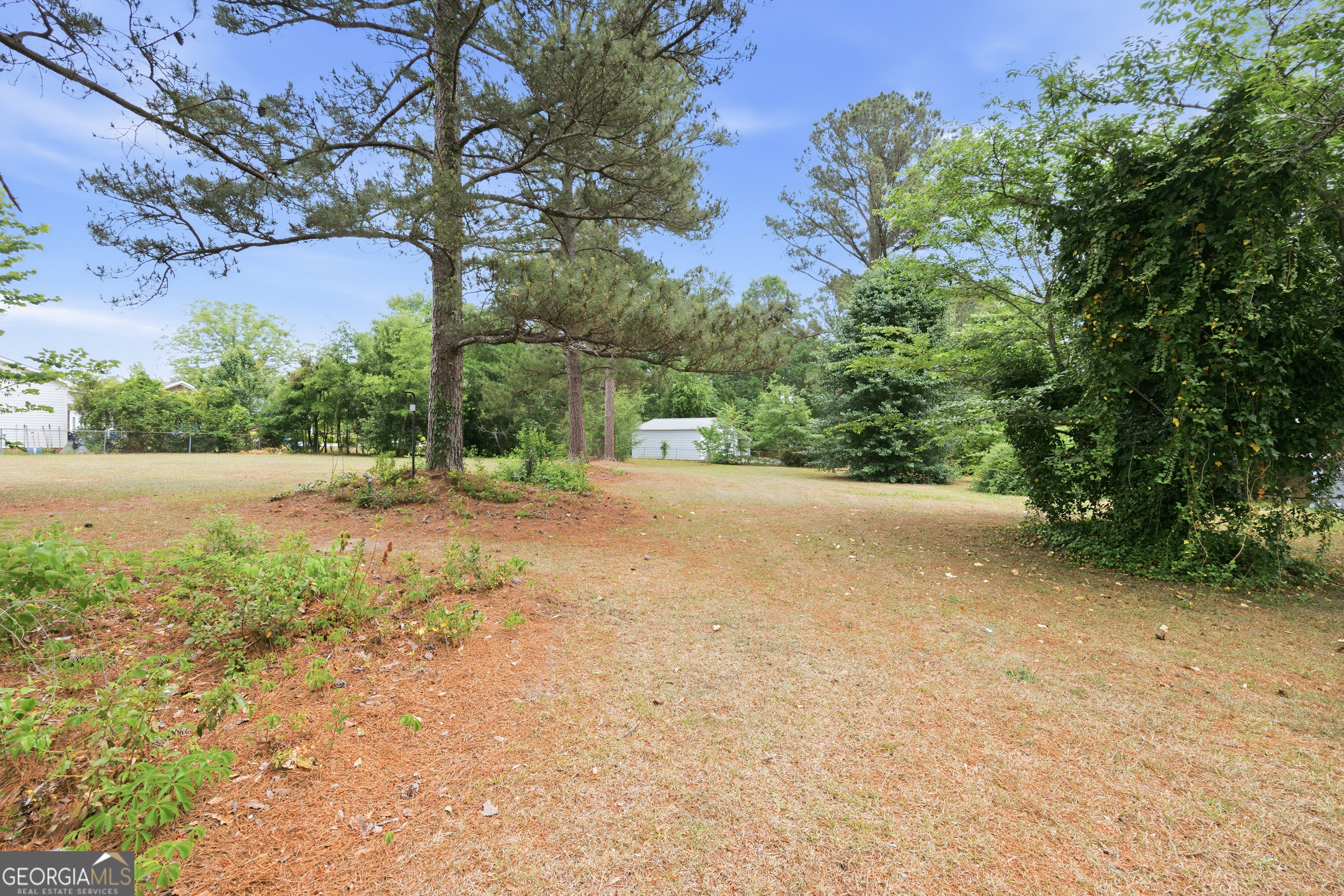 3773 Trophy Place Lizella, GA 31052 - Photo 26 of 32 a view of road with large trees
