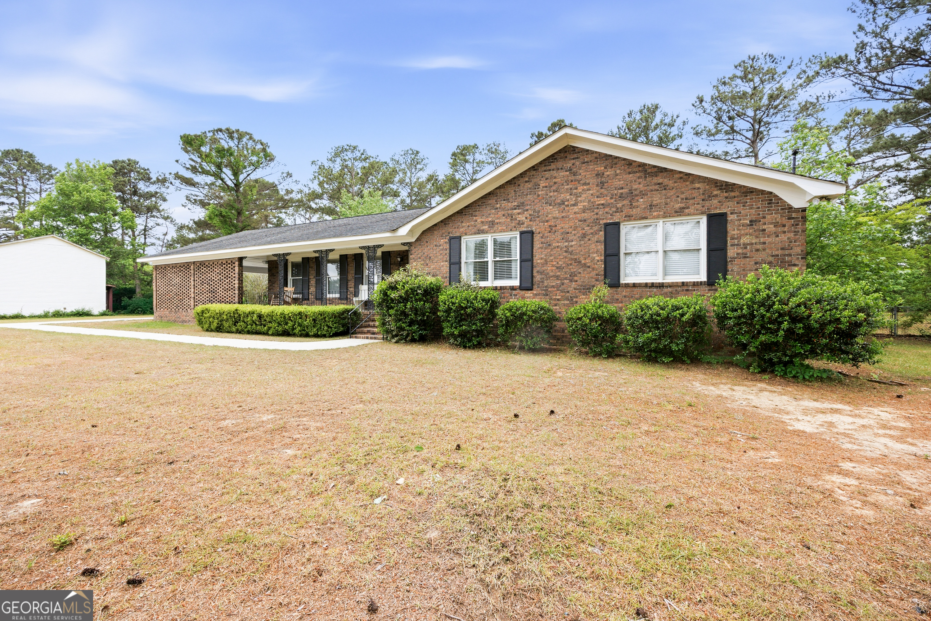 3773 Trophy Place Lizella, GA 31052 - Photo 32 of 32 a view of a house with a yard