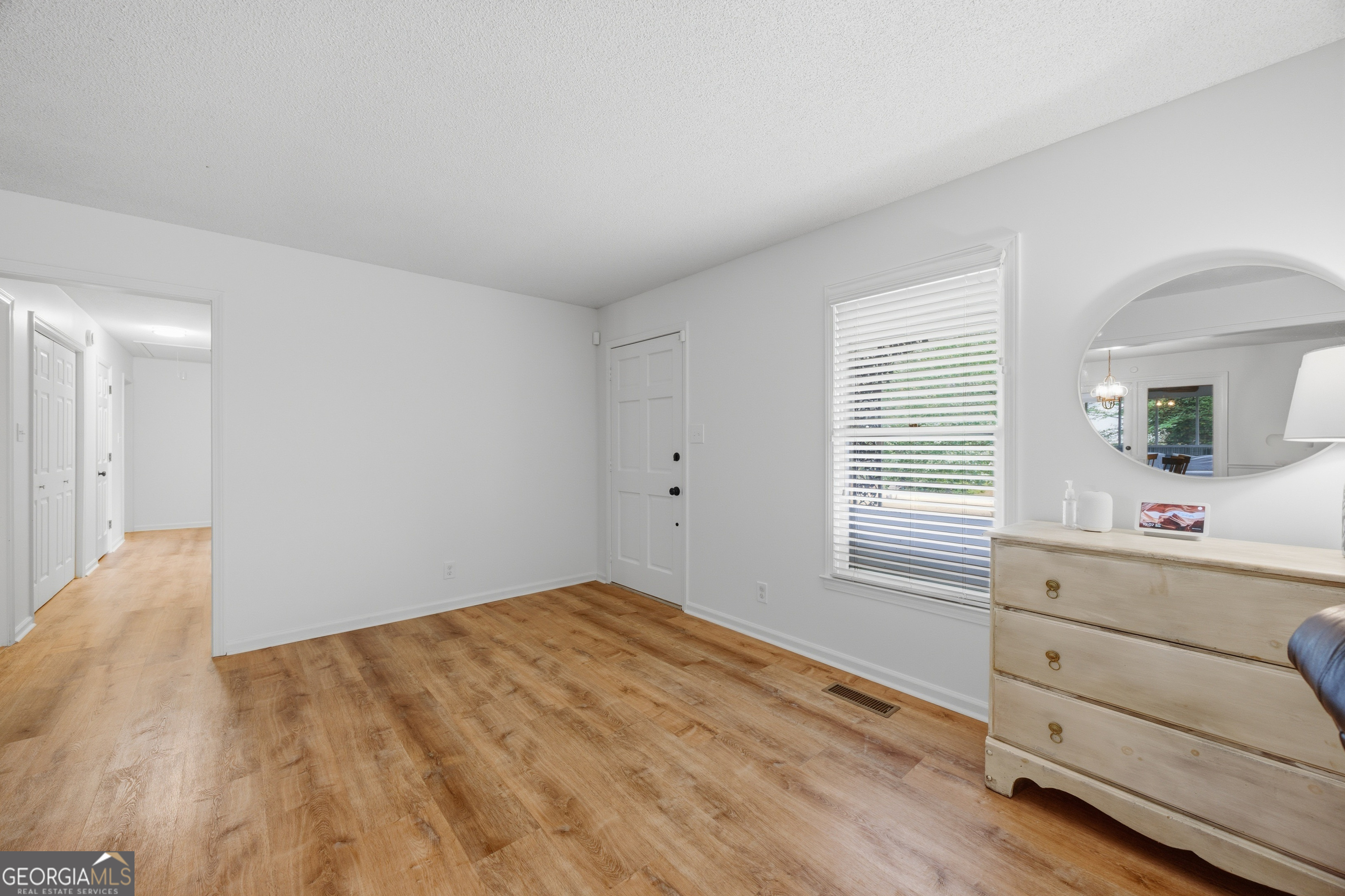 3773 Trophy Place Lizella, GA 31052 - Photo 7 of 32 a room with a window and dresser