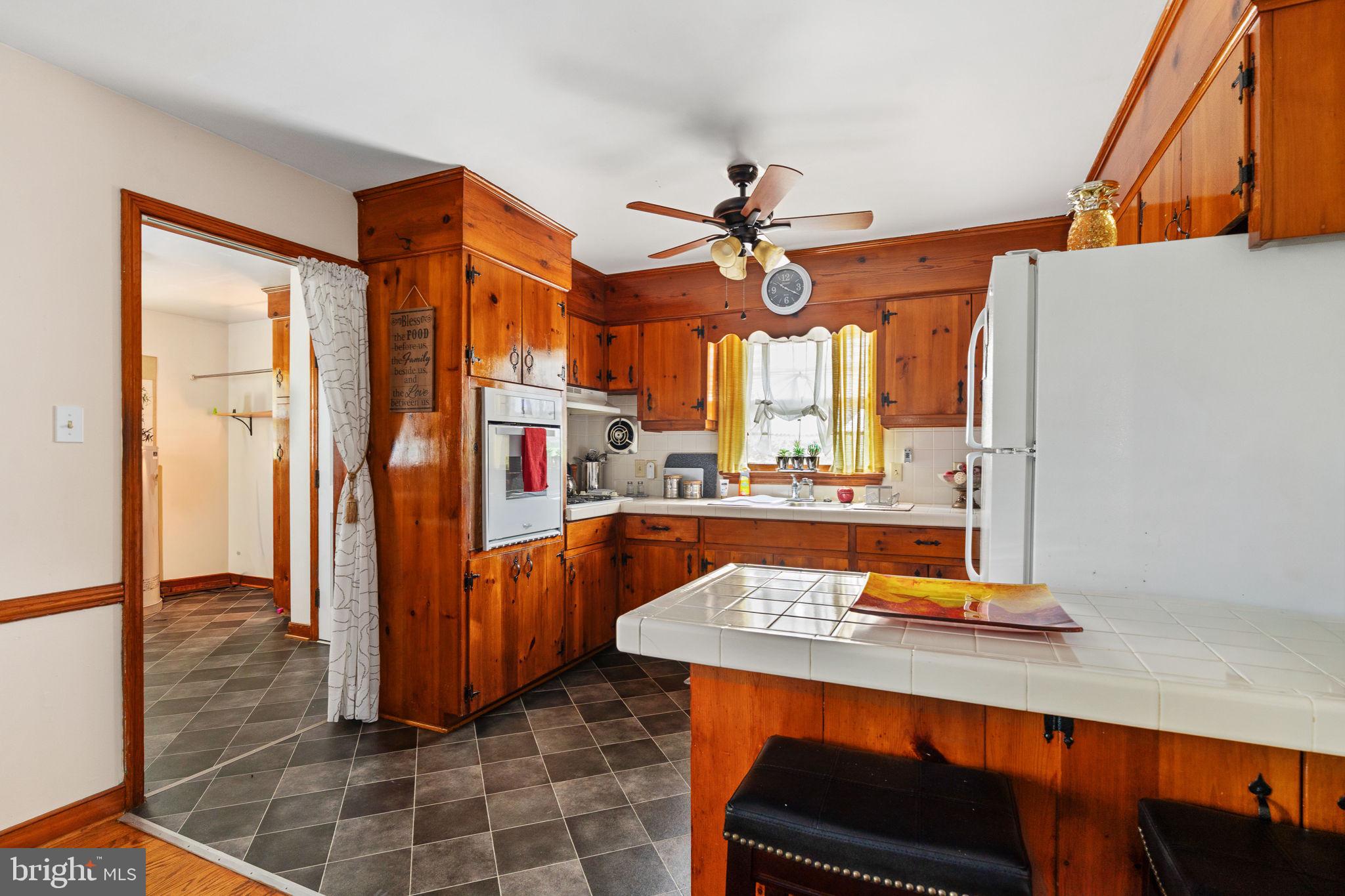 1440 Holly Farm Road Burkeville, VA 23922 - Photo 32 of 52 Warm wooden kitchen with inviting charm.