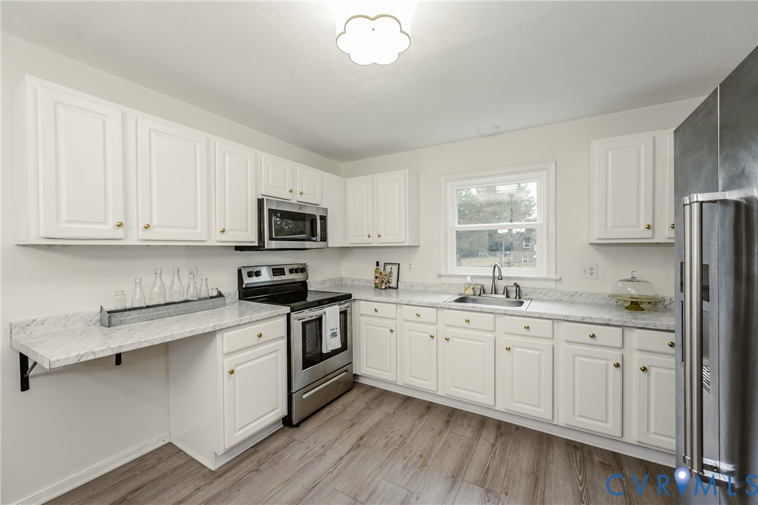 81 Carter Road Cumberland, VA 23040 - Photo 27 of 50 Kitchen featuring stainless steel appliances, whit